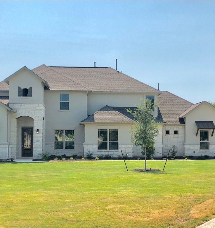 3608 Juniper Rim Road Leander, TX 78641 - Photo 1 of 1 a front view of a house with a swimming pool