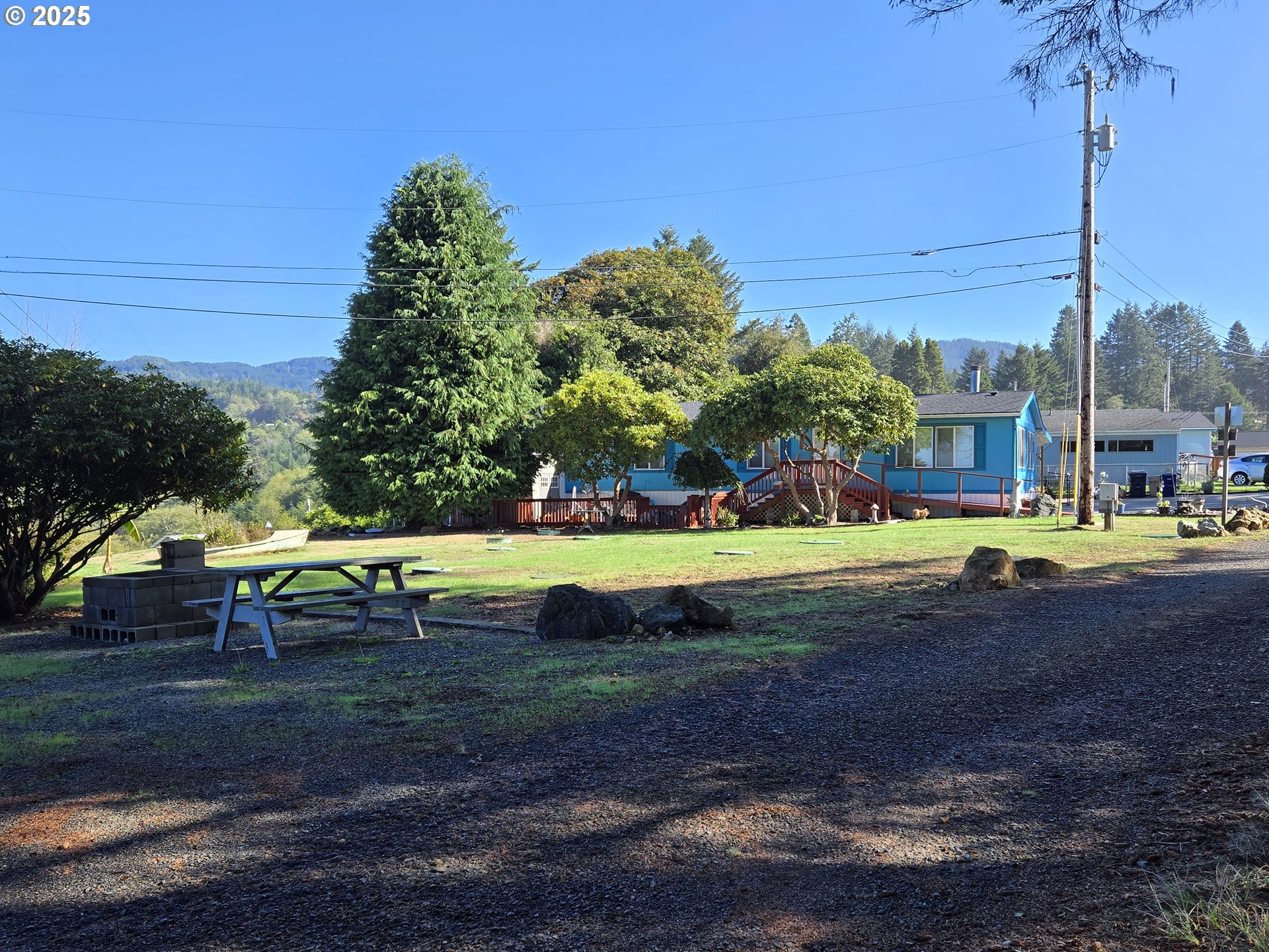 96465 Coverdell Road, Unit 8 Brookings, OR 97415 - Photo 12 of 42 a view of yard with green space