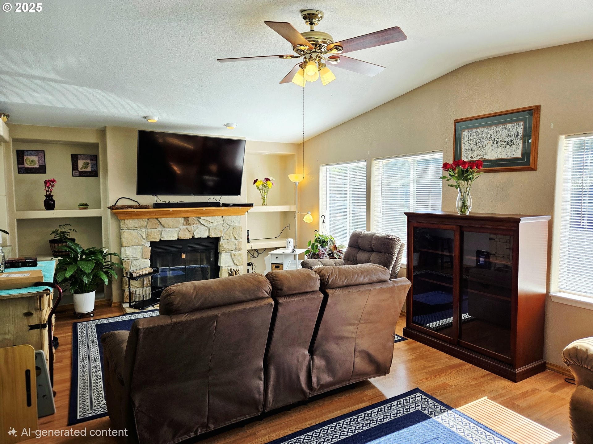 96465 Coverdell Road, Unit 8 Brookings, OR 97415 - Photo 14 of 42 a living room with furniture a flat screen tv and a fireplace