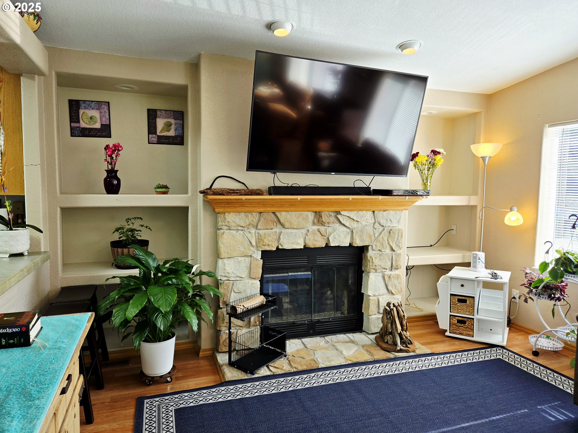 96465 Coverdell Road, Unit 8 Brookings, OR 97415 - Photo 15 of 42 a living room with furniture and a flat screen tv