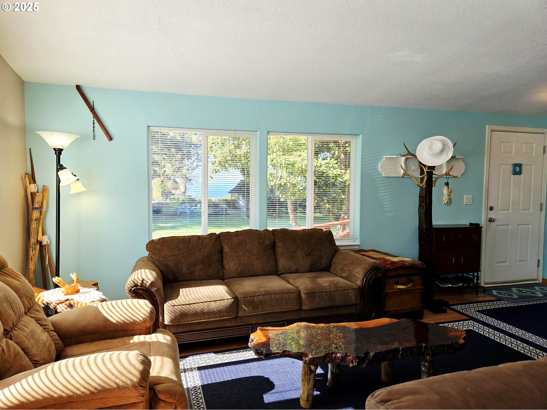 96465 Coverdell Road, Unit 8 Brookings, OR 97415 - Photo 16 of 42 a living room with furniture and a window
