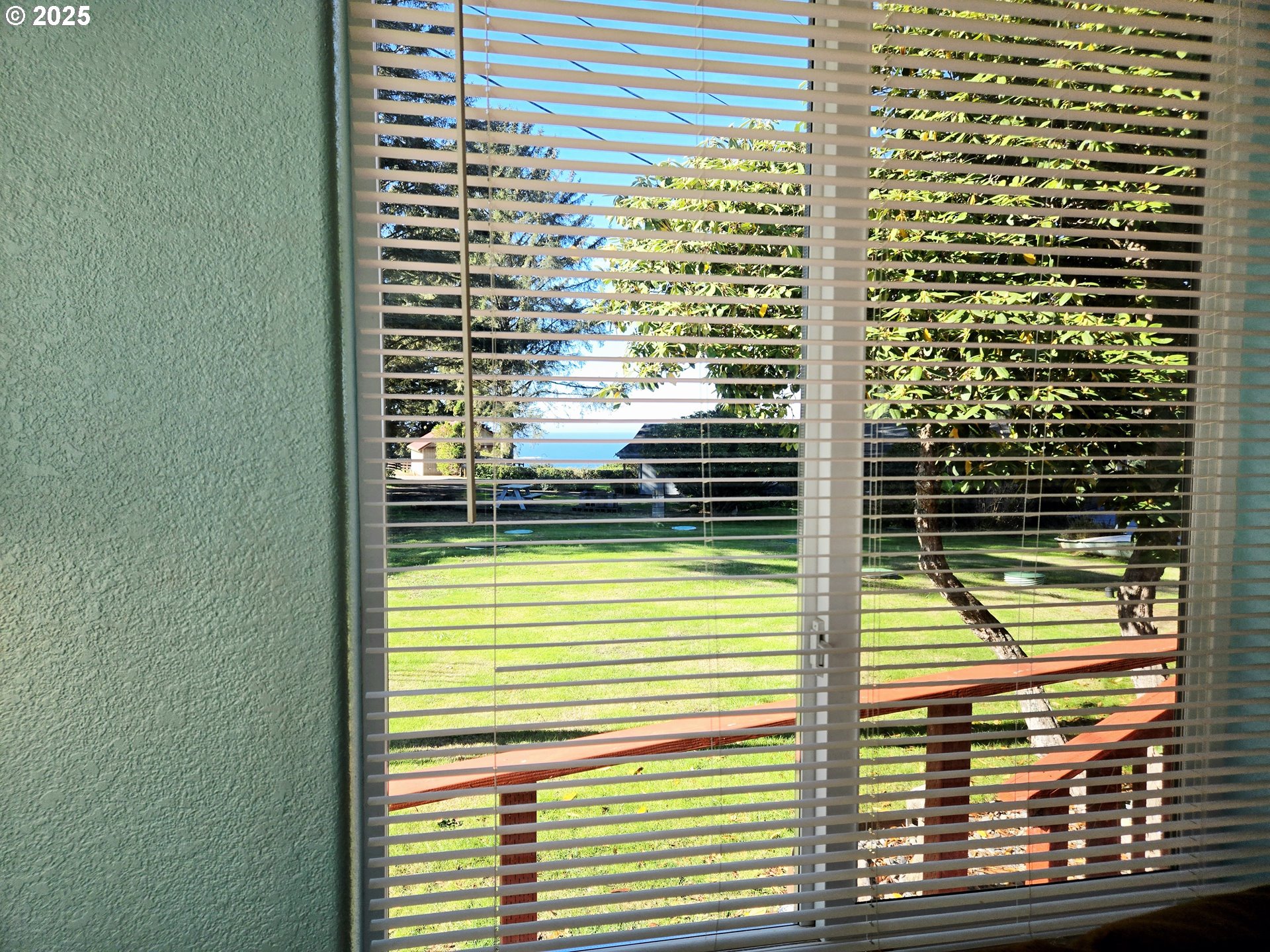 96465 Coverdell Road, Unit 8 Brookings, OR 97415 - Photo 17 of 42 a view of a balcony with a door