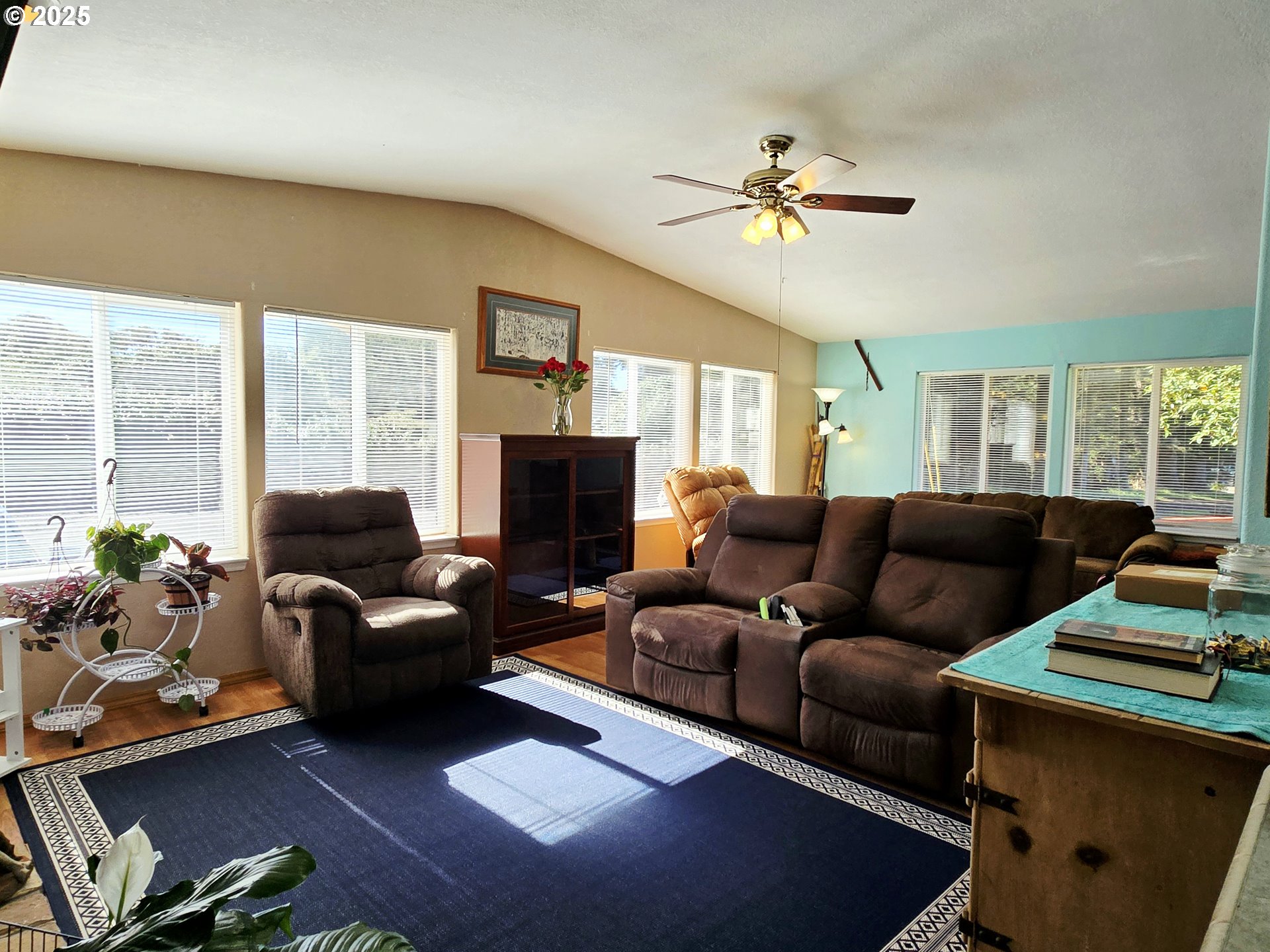 96465 Coverdell Road, Unit 8 Brookings, OR 97415 - Photo 19 of 42 a living room with furniture and a fireplace