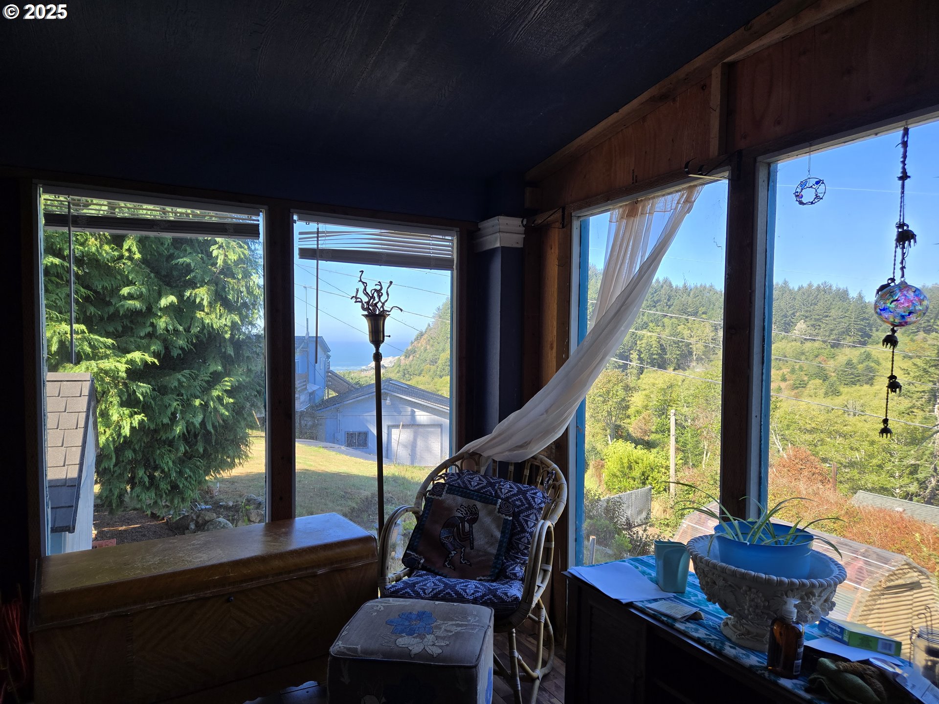 96465 Coverdell Road, Unit 8 Brookings, OR 97415 - Photo 28 of 42 a view of a room with furniture and wooden floor