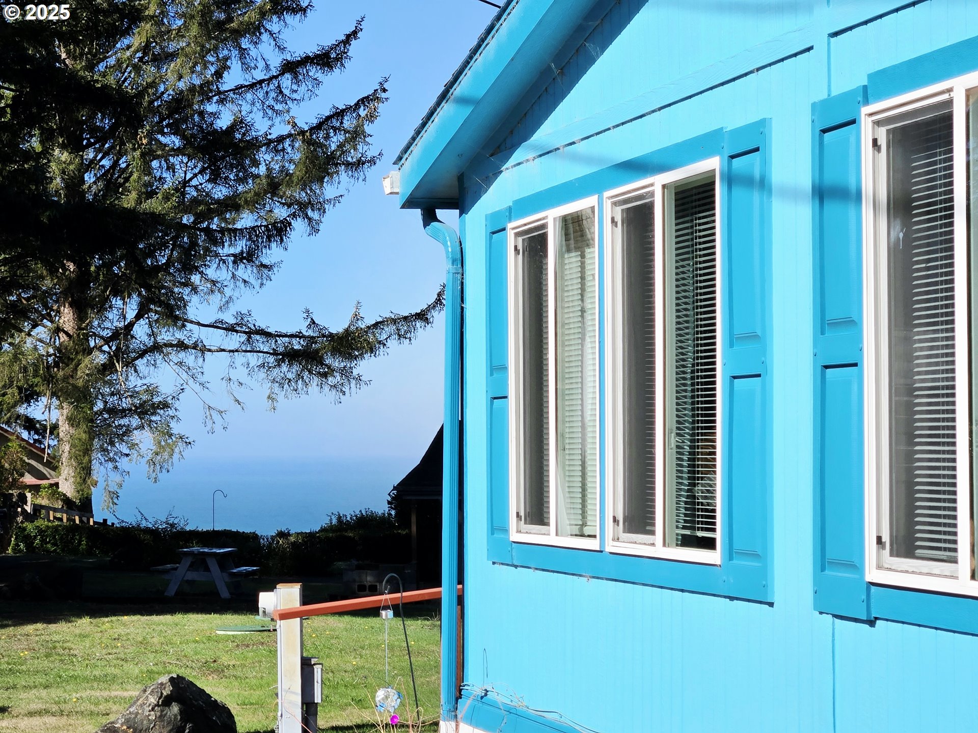96465 Coverdell Road, Unit 8 Brookings, OR 97415 - Photo 3 of 42 a view of a balcony with an outdoor space