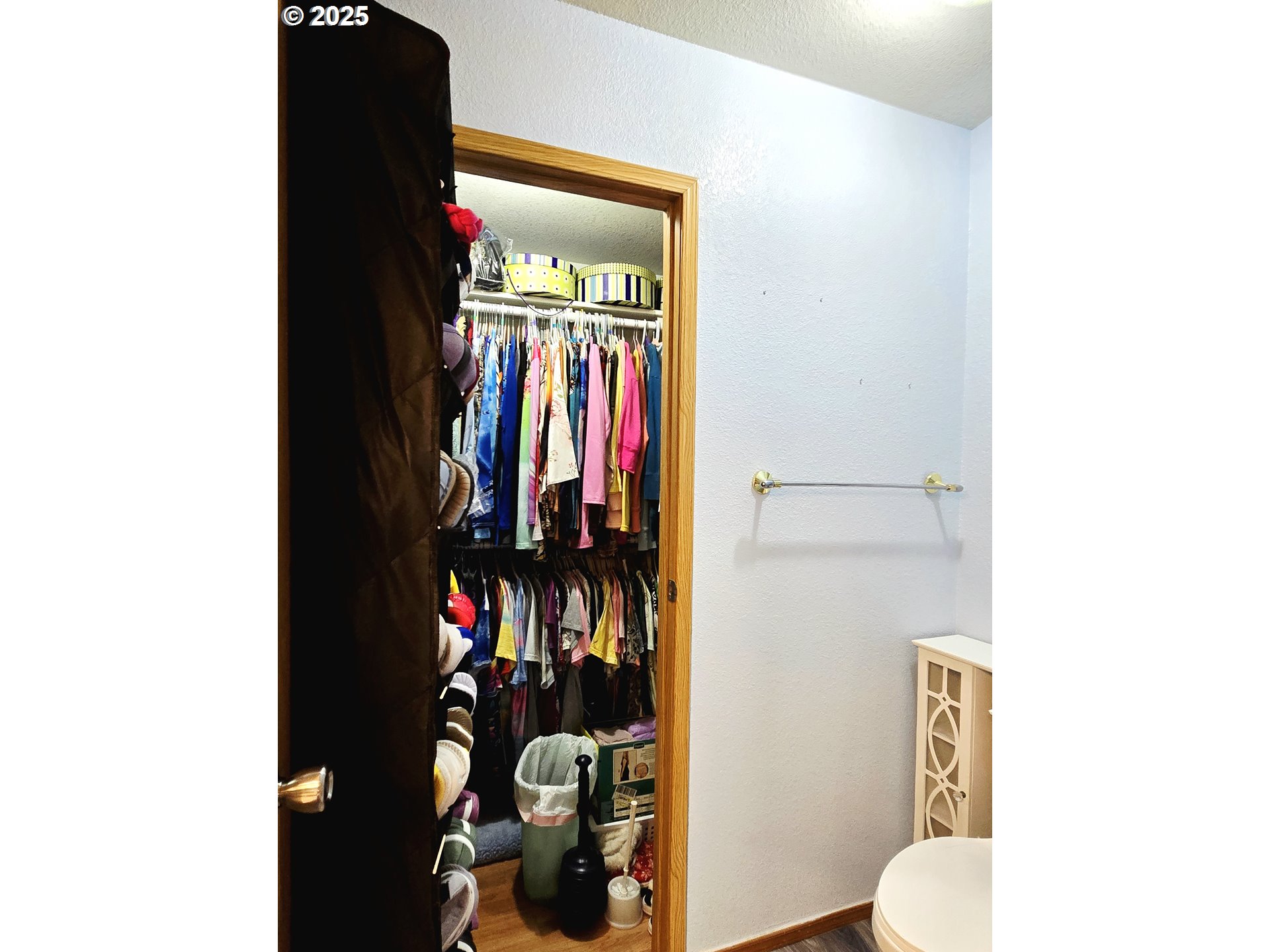 96465 Coverdell Road, Unit 8 Brookings, OR 97415 - Photo 38 of 42 a view of walk in closet with clothes and shoes