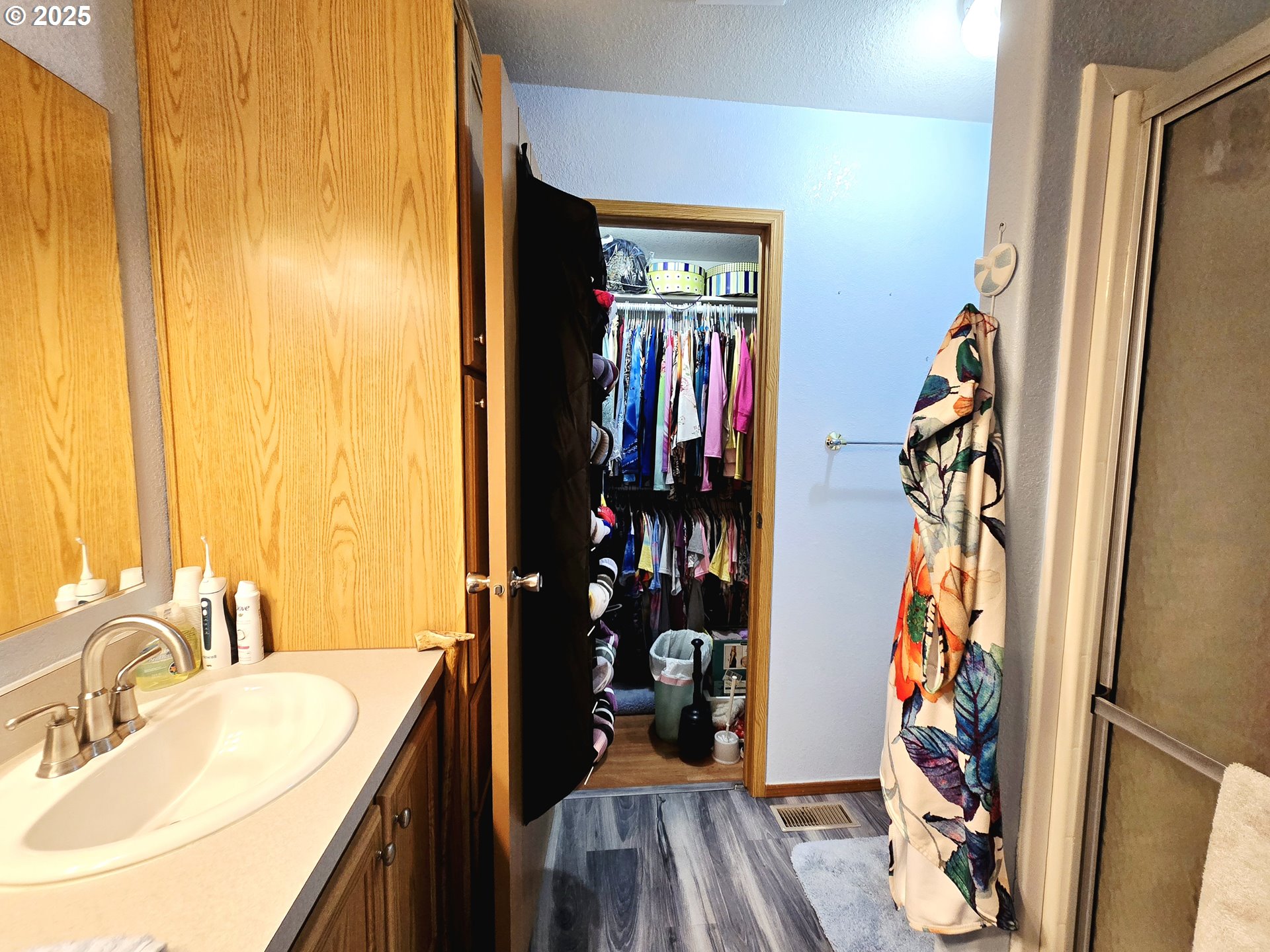 96465 Coverdell Road, Unit 8 Brookings, OR 97415 - Photo 39 of 42 a bathroom with a sink and a mirror
