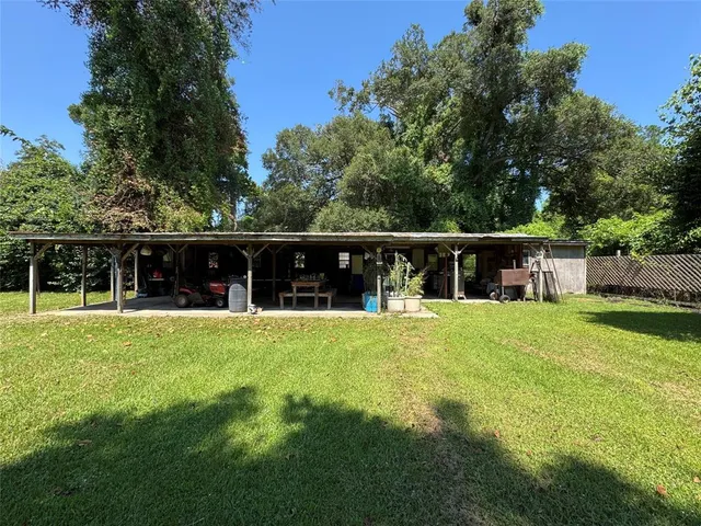 a view of a green field with clear sky