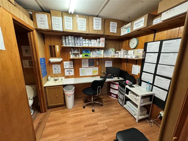 a room with furniture and wooden floor