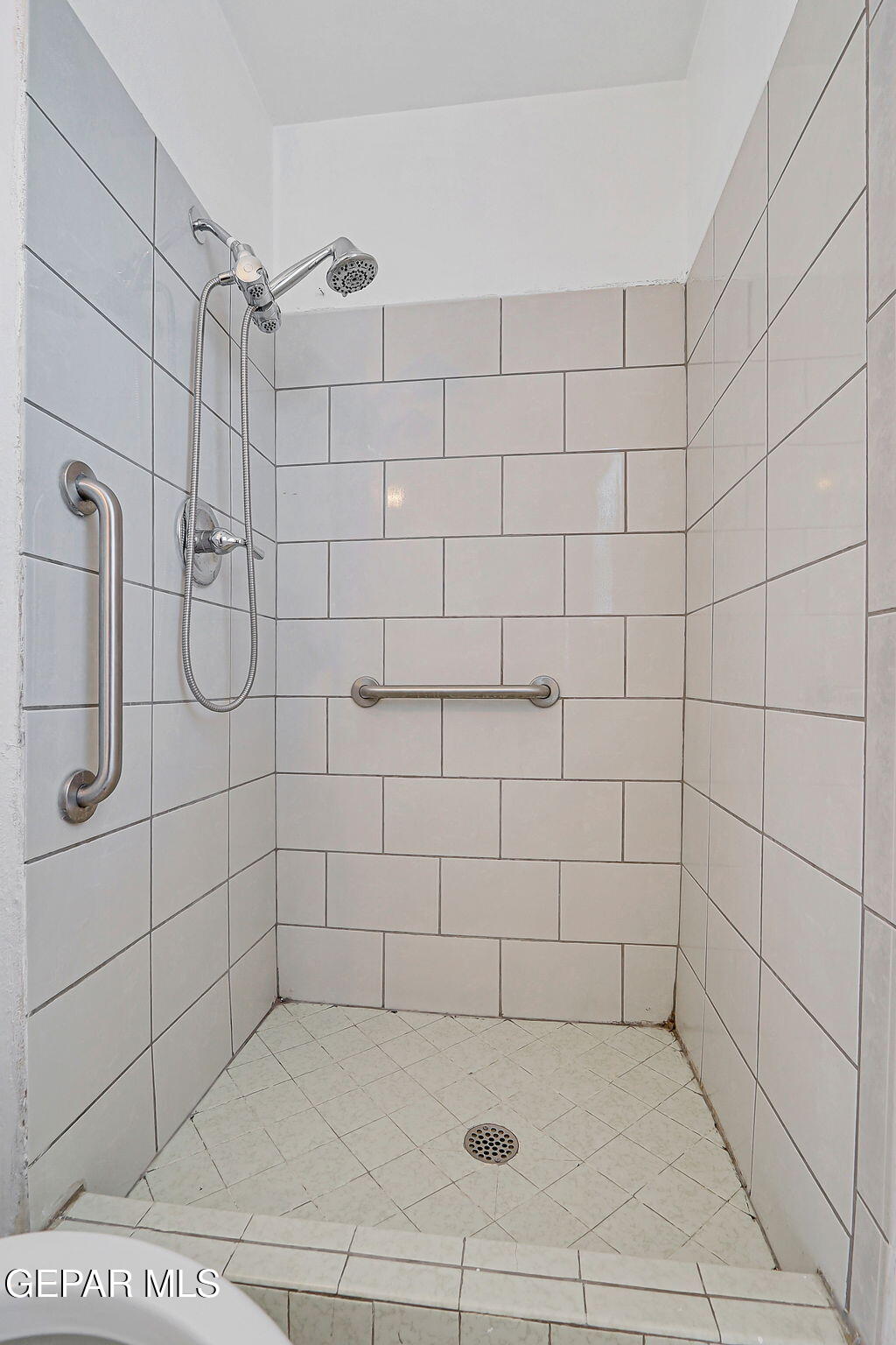 9108 Morelia Road El Paso, TX 79907 - Photo 25 of 35 a bathroom with a shower