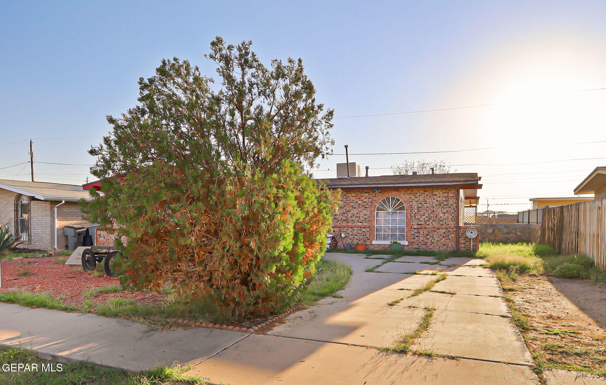 9108 Morelia Road El Paso, TX 79907 - Photo 7 of 35 a pathway of a house with a yard