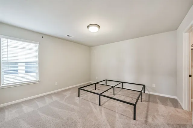 a view of a room with a window