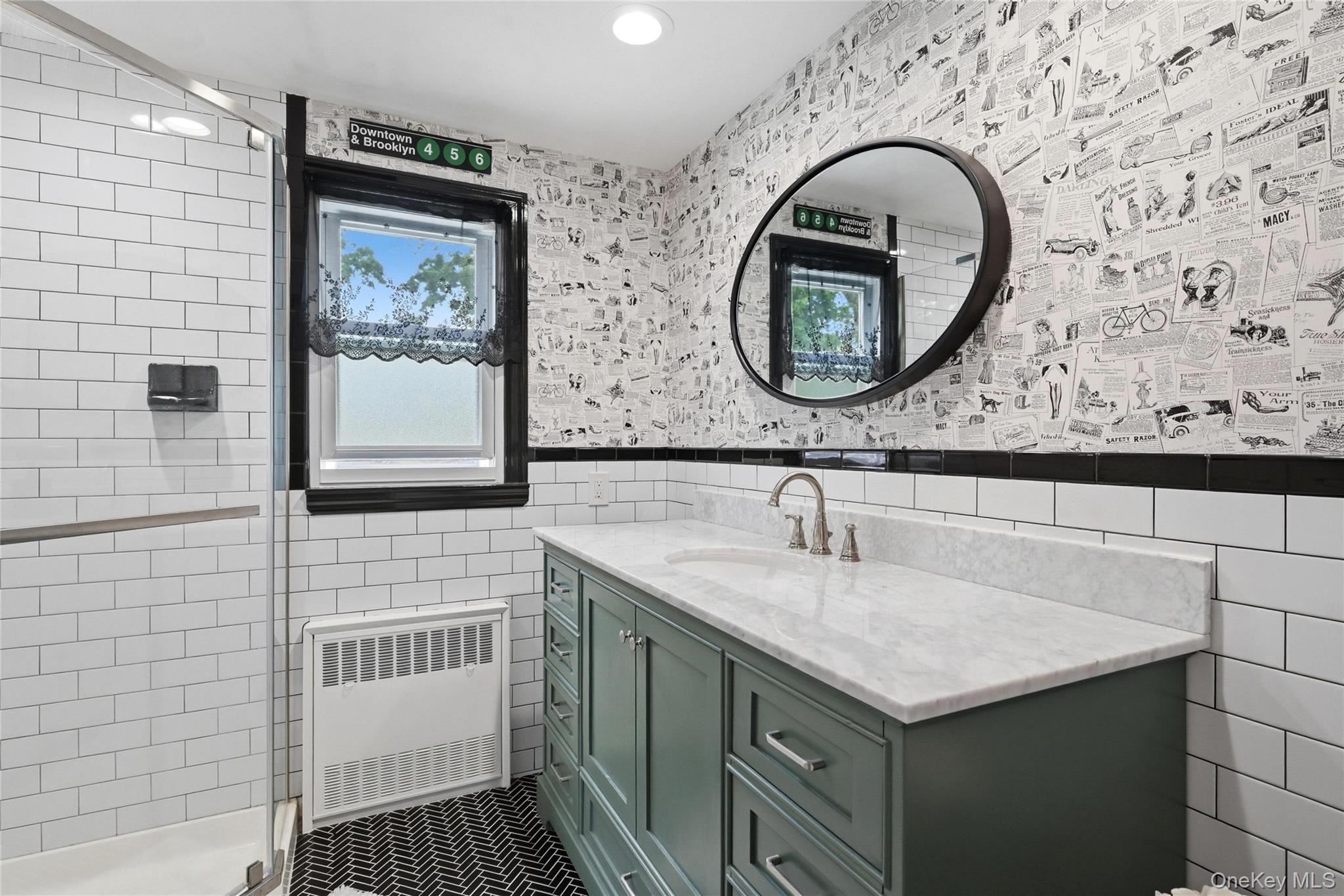 41 Lane Street Lindenhurst, NY 11757 - Photo 24 of 35 Second floor RENOVATED bathroom with step-in shower, tile surround