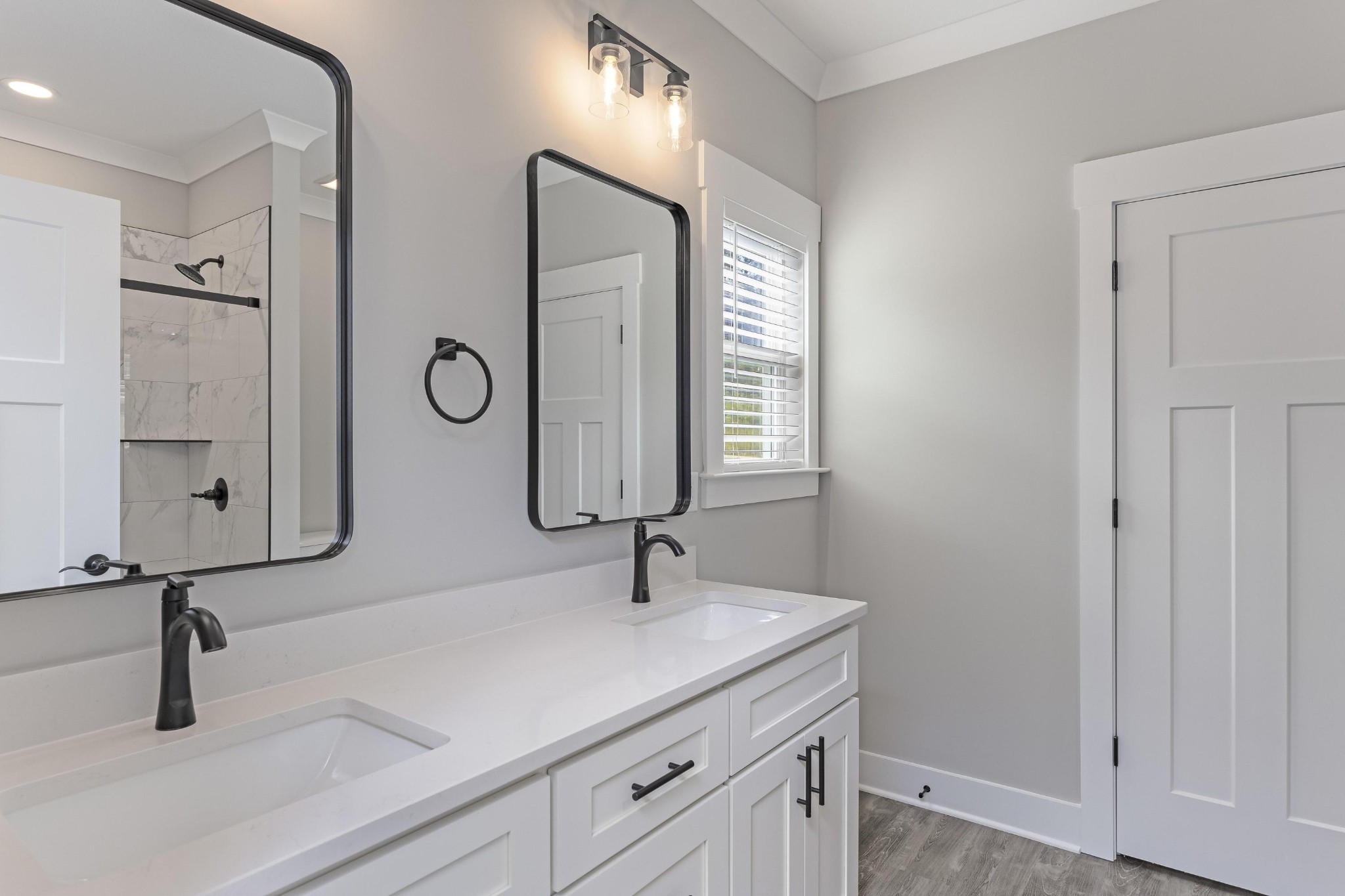 2151 Old Federal Road Ocoee, TN 37361 - Photo 19 of 31 a bathroom with double sink and a mirror