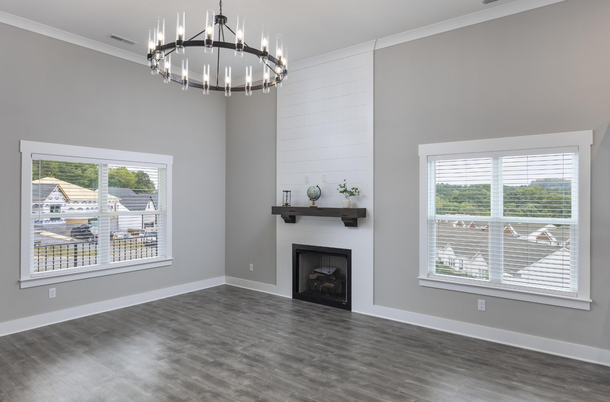 2151 Old Federal Road Ocoee, TN 37361 - Photo 6 of 31 a view of an empty room with wooden floor fireplace and a window