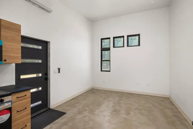 a kitchen with stainless steel appliances a refrigerator and a sink