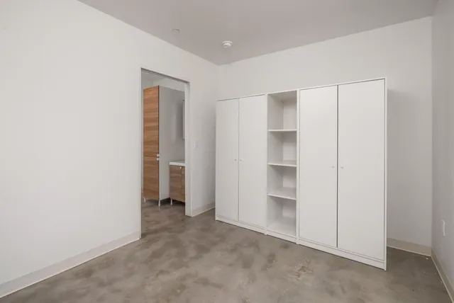 a view of a hallway with closet