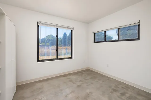 a view of storage and utility room with washer and dryer