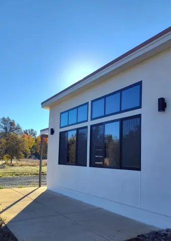 a view of house with outdoor space