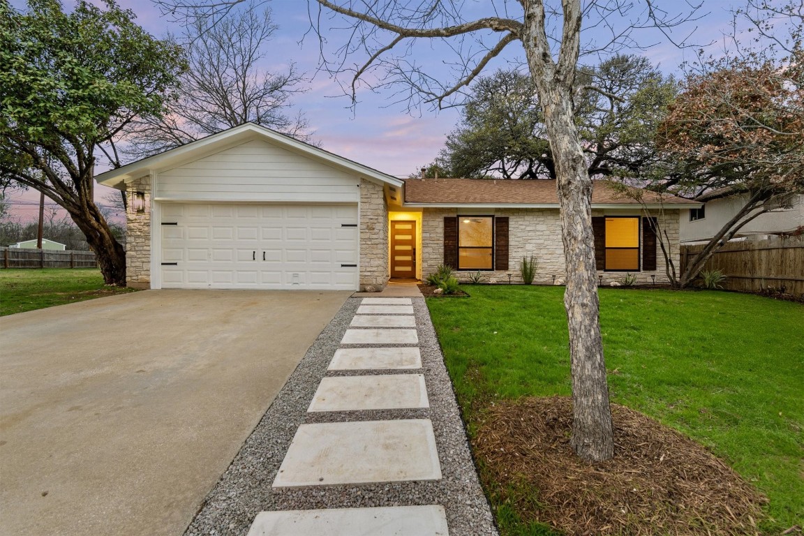 5102 Summerset Trail Austin, TX 78749 - Photo 1 of 39 a front view of a house with a yard