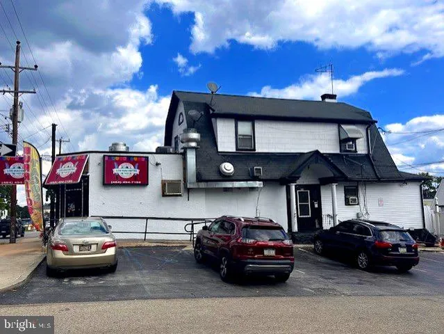 a car parked in front of a house