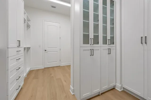 a view of an empty walk in closet