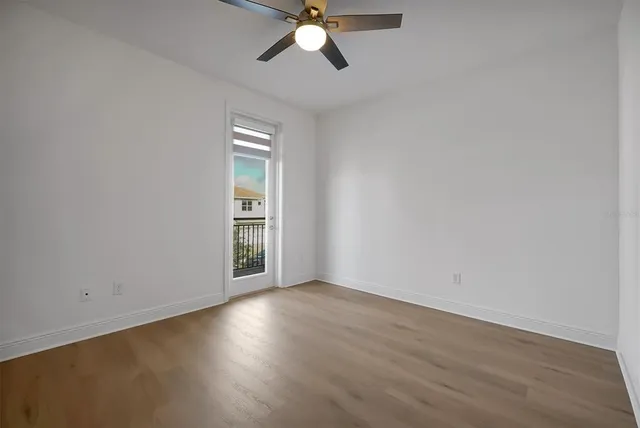 a view of a room with storage and racks on the wall