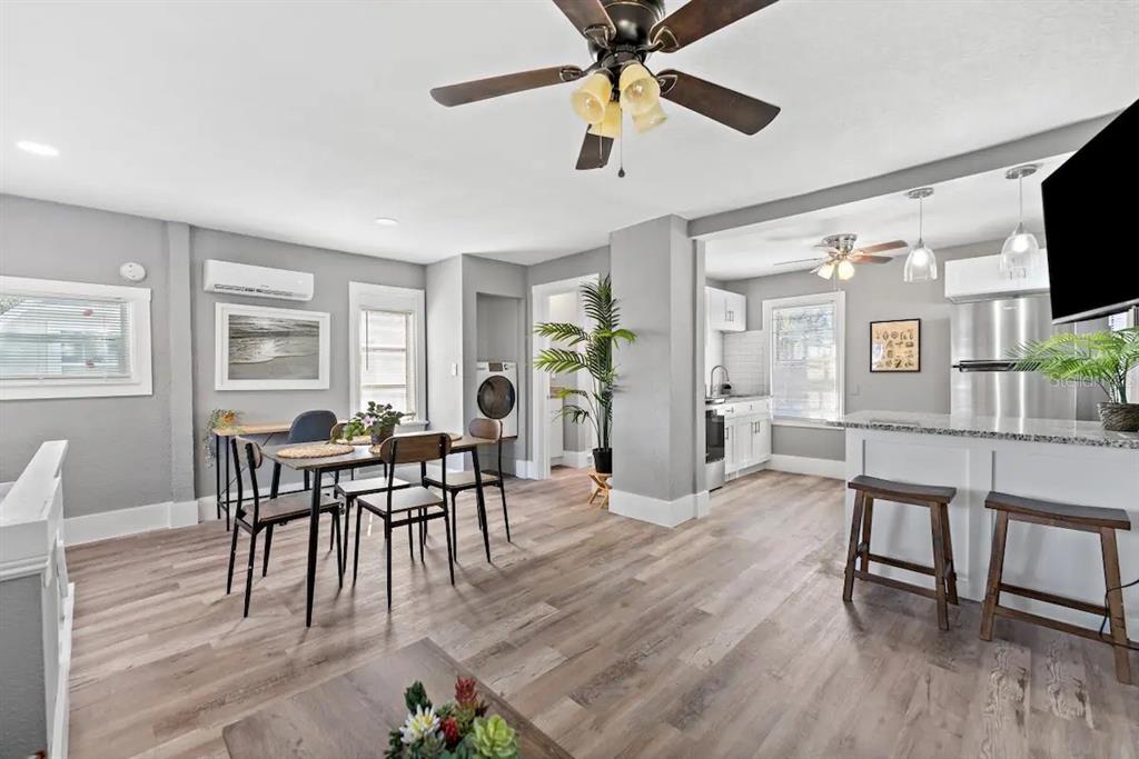 3320 18th Street North St. Petersburg, FL 33713 - Photo 16 of 28 a view of a dining room with furniture and wooden floor