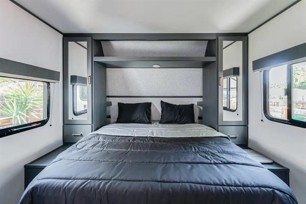 3320 18th Street North St. Petersburg, FL 33713 - Photo 28 of 28 a bedroom with a large bed and a large window