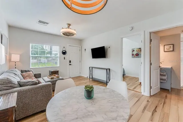 a bedroom with furniture and a window