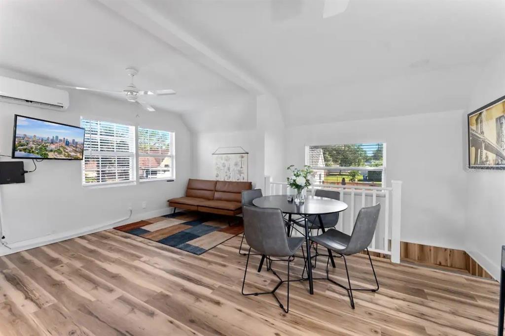 3320 18th Street North St. Petersburg, FL 33713 - Photo 6 of 28 a bedroom with furniture and a window