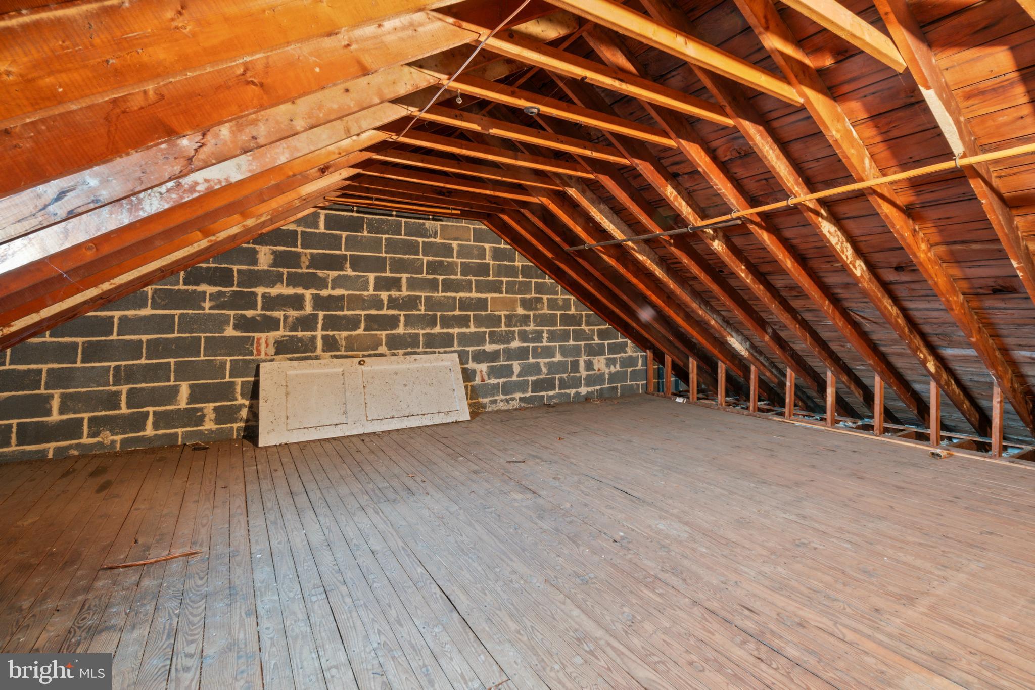 1909 Heathfield Road Baltimore, MD 21239 - Photo 13 of 22 a view of an outdoor space with wooden floor and fence
