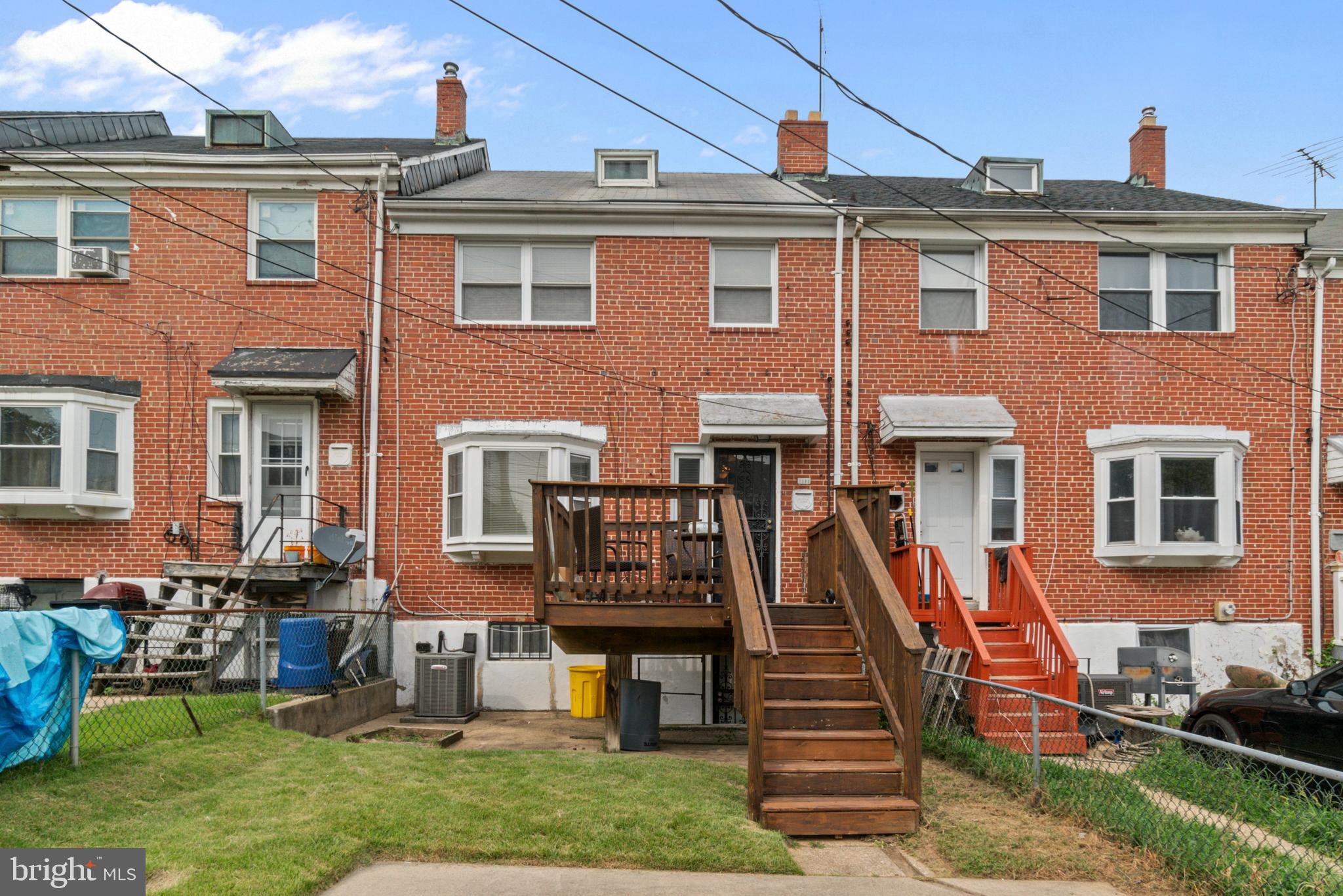 1909 Heathfield Road Baltimore, MD 21239 - Photo 21 of 22 a front view of a house with a yard