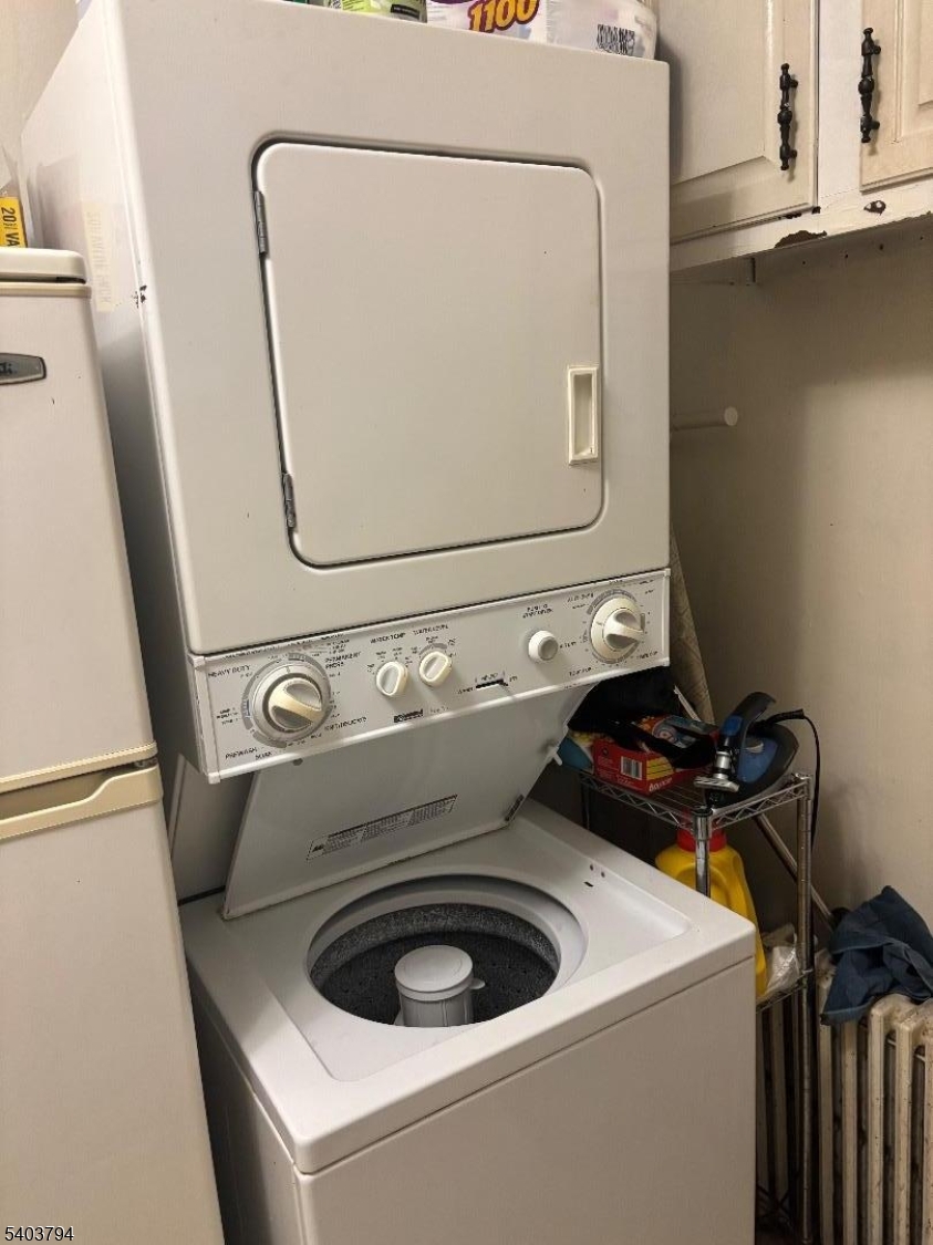 22 Hillcrest Road Warren, NJ 07059 - Photo 8 of 8 a utility room with dryer and washer