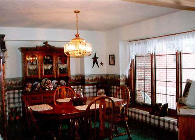 21626 Mill Road Prophetstown, IL 61277 - Photo 3 of 9 a view of a dining room with furniture and window