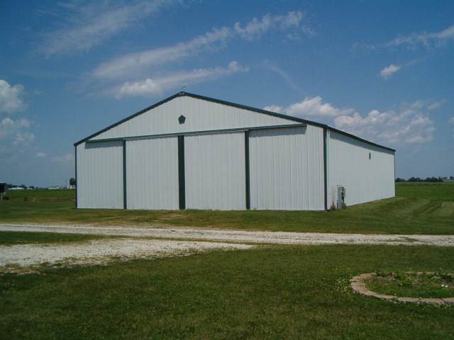 21626 Mill Road Prophetstown, IL 61277 - Photo 8 of 9 a view of a big room with a yard