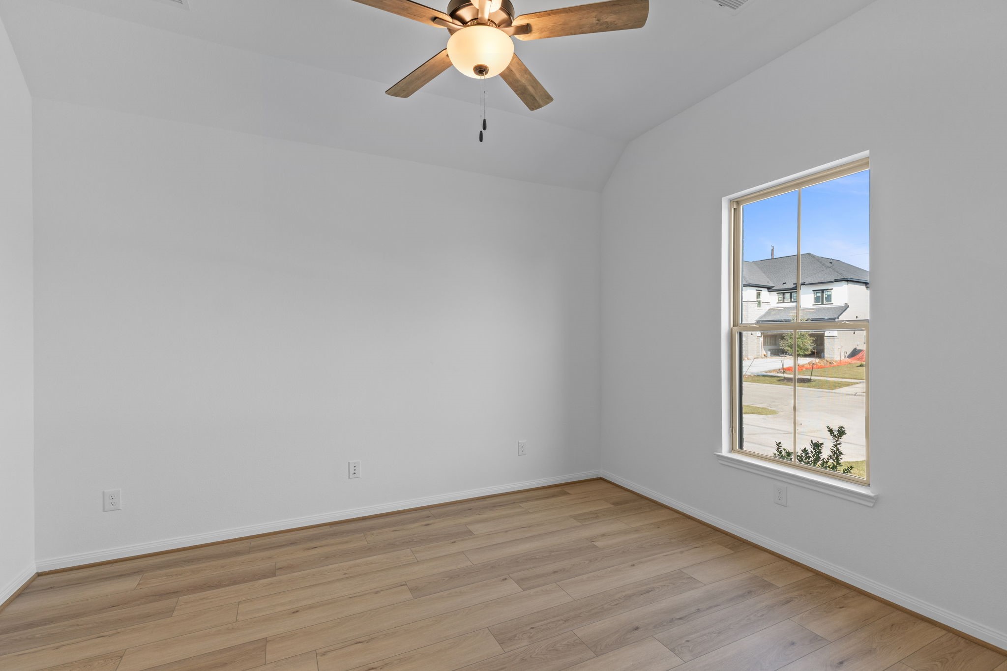 2518 Gleaming Pear Drive Manvel, TX 77578 - Photo 15 of 28 wooden floor in an empty room with a window