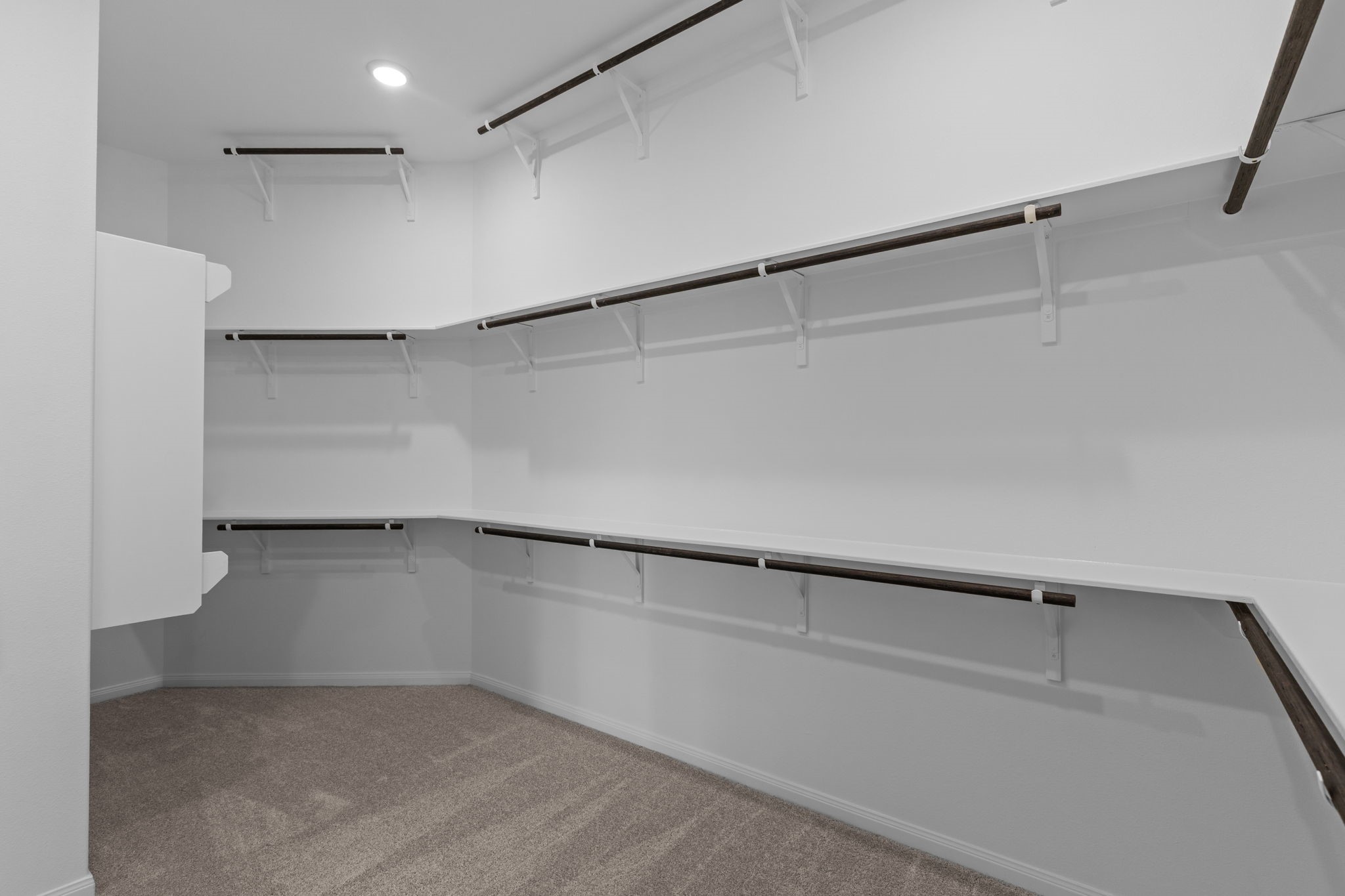 2518 Gleaming Pear Drive Manvel, TX 77578 - Photo 21 of 28 a view of an empty walk in closet