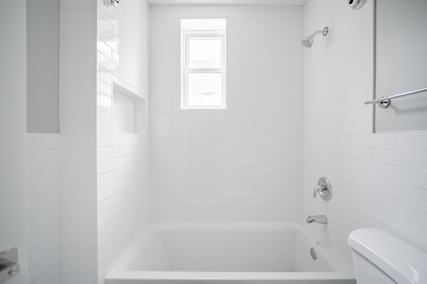 1472 West Erie Street, Unit 2F Chicago, IL 60642 - Photo 17 of 25 a close up of a bathtub curtain