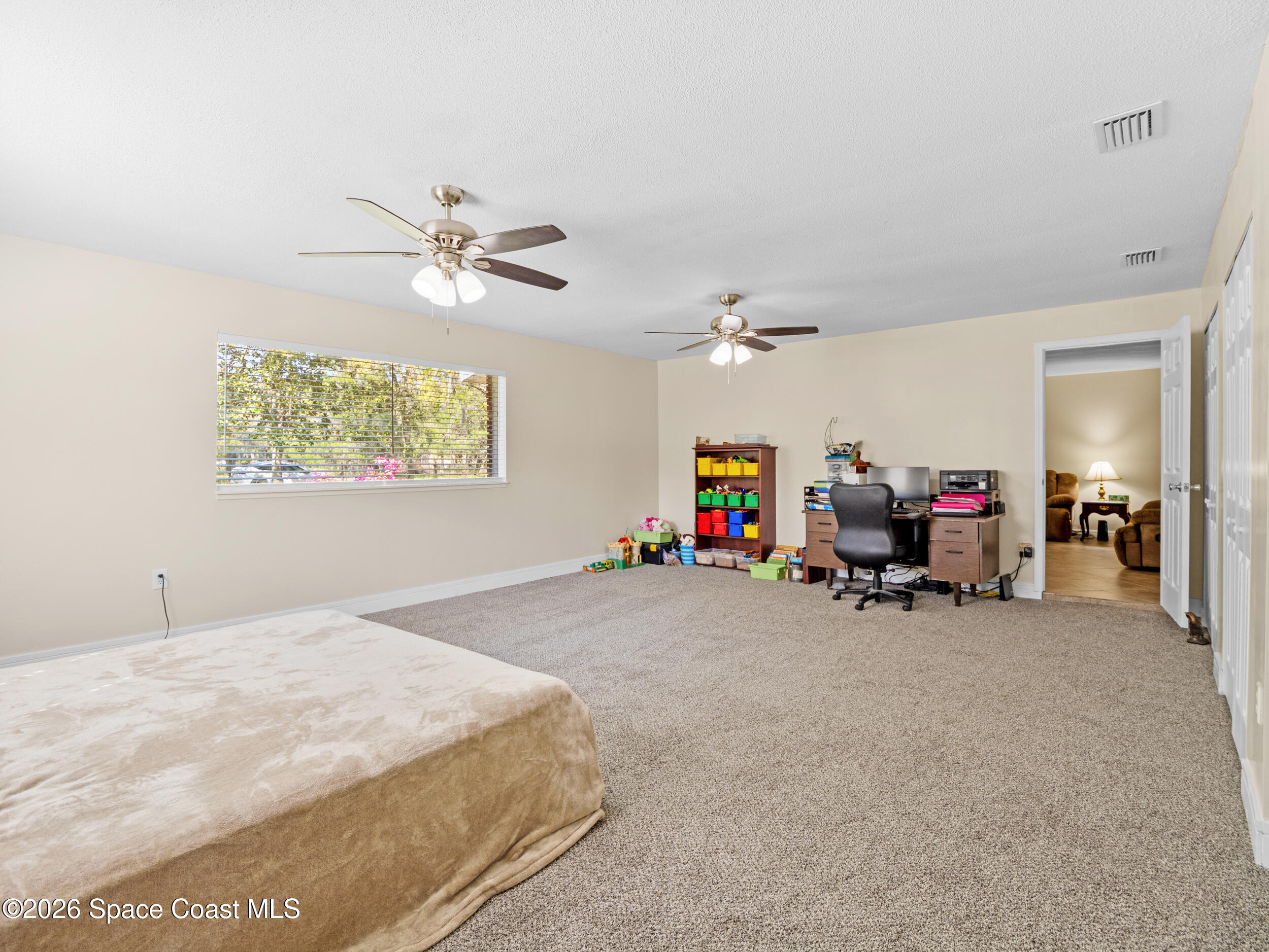 3535 Montgomery Road Mims, FL 32754 - Photo 14 of 57 Owners Suite