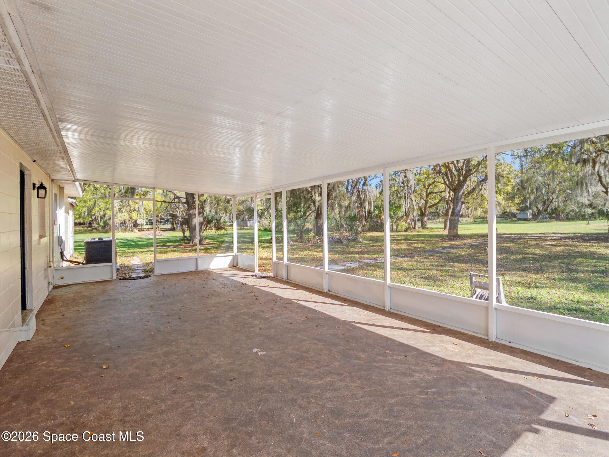3535 Montgomery Road Mims, FL 32754 - Photo 21 of 57 Screened Porch
