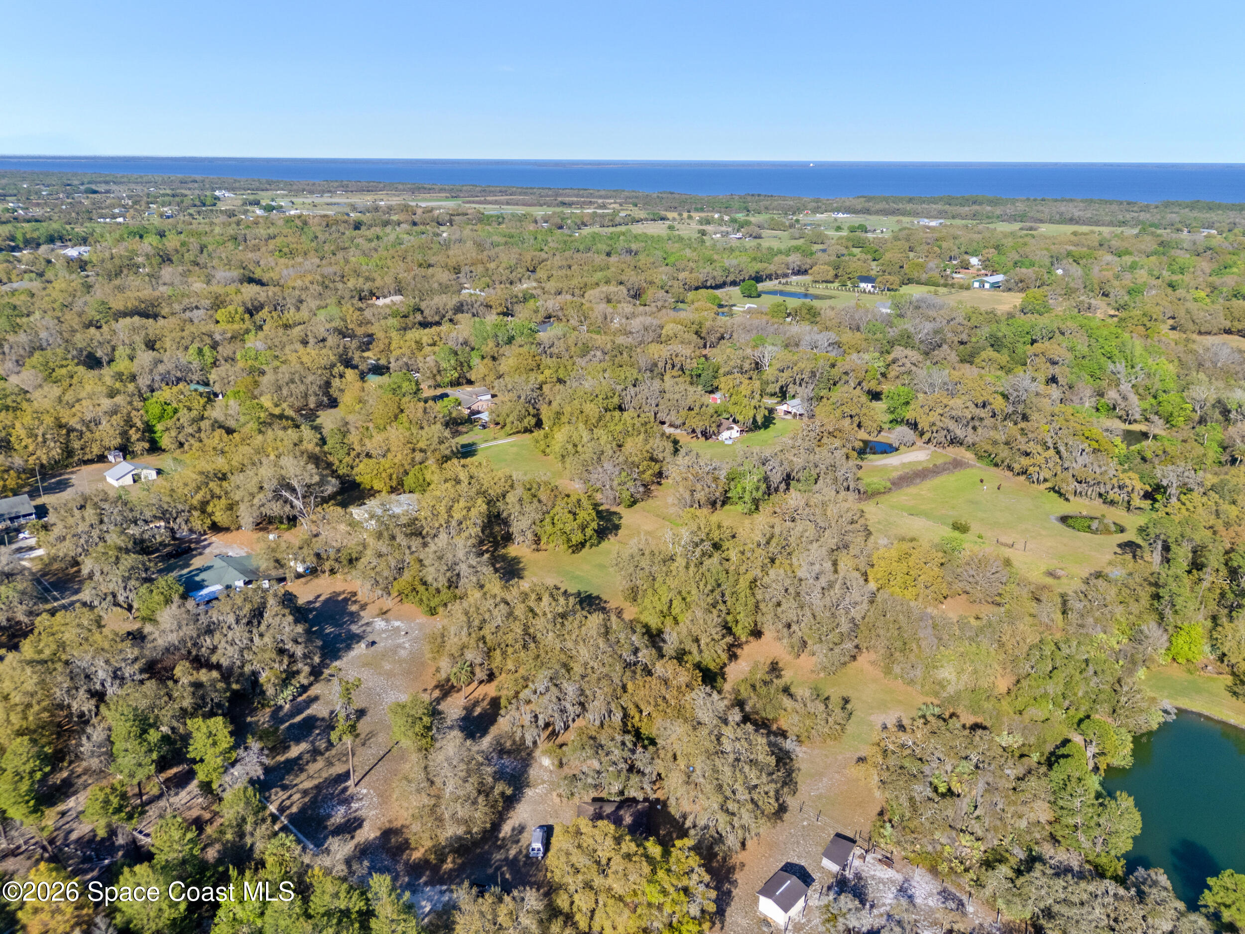 3535 Montgomery Road Mims, FL 32754 - Photo 44 of 53 a view of an outdoor space and a lake view
