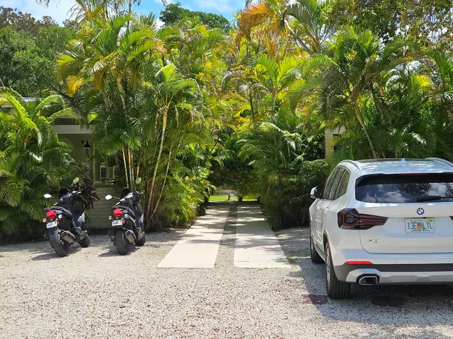 a car parked in front of a house