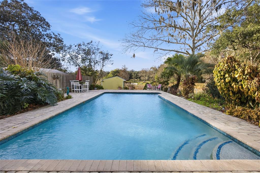10400 Southeast 101st Avenue Road Belleview, FL 34420 - Photo 37 of 59 a view of swimming pool from a balcony