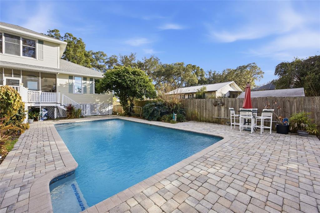 10400 Southeast 101st Avenue Road Belleview, FL 34420 - Photo 39 of 59 a view of a swimming pool with sitting area