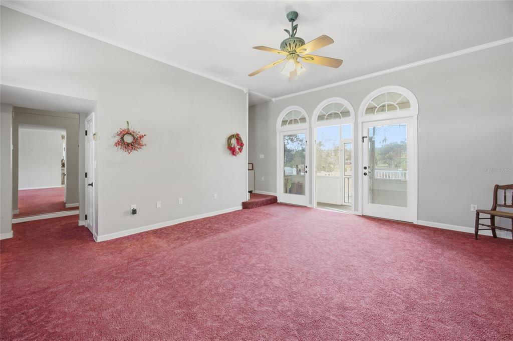 10400 Southeast 101st Avenue Road Belleview, FL 34420 - Photo 6 of 59 a view of an empty room with a window