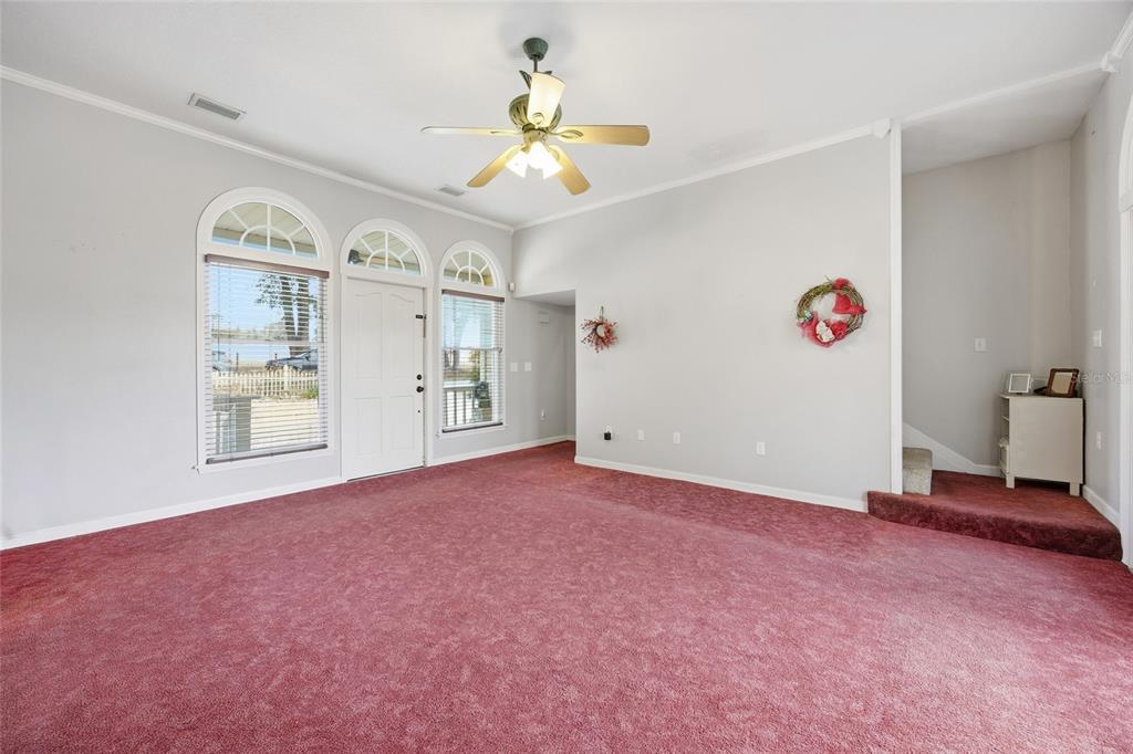 10400 Southeast 101st Avenue Road Belleview, FL 34420 - Photo 8 of 59 a view of an empty room with a window