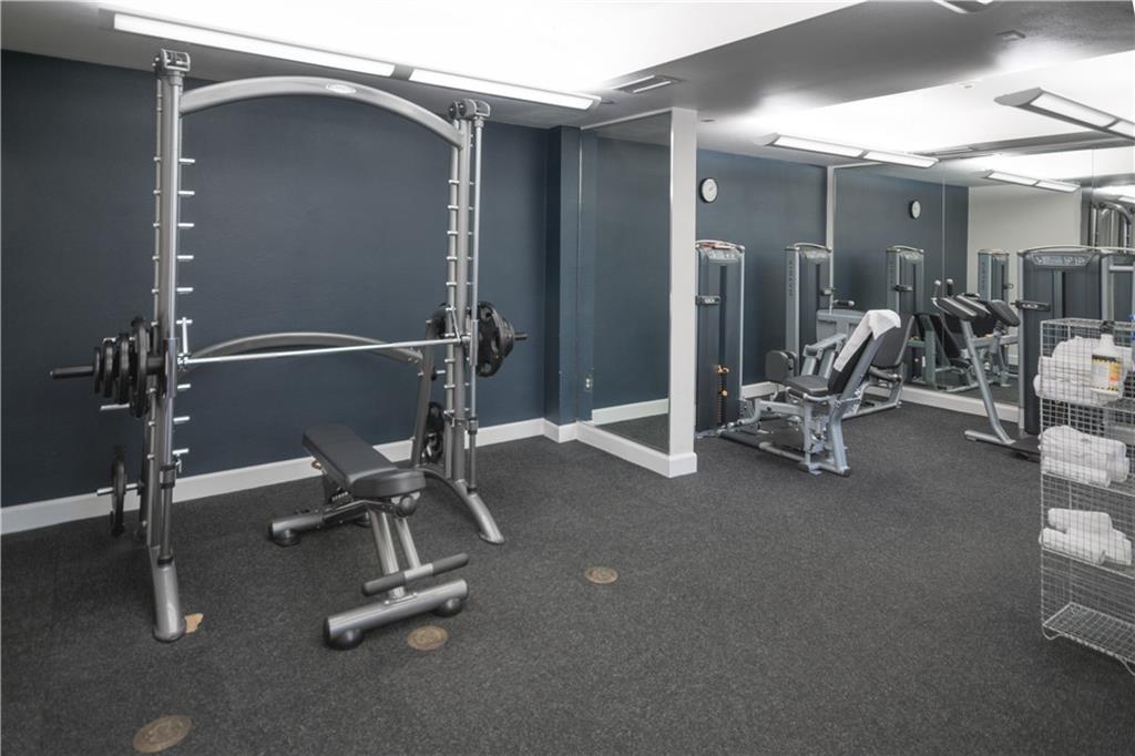 3445 Stratford Road Northeast, Unit 2107 Atlanta, GA 30326 - Photo 18 of 22 a view of a room with gym equipment