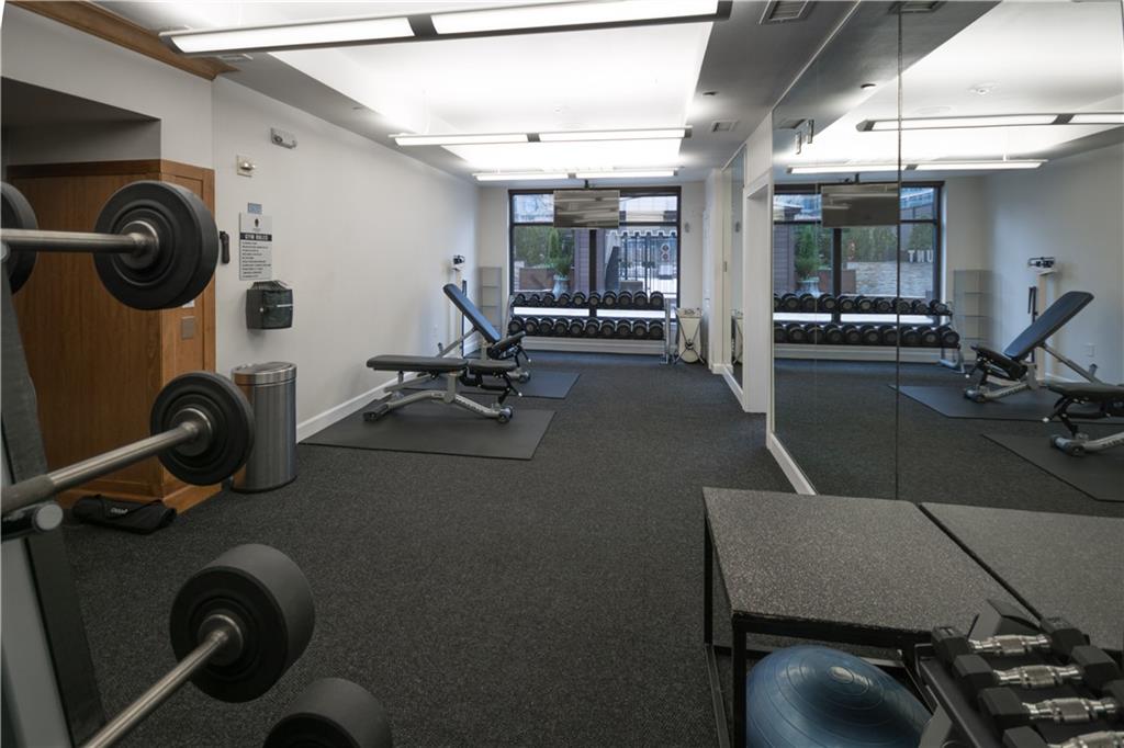 3445 Stratford Road Northeast, Unit 2107 Atlanta, GA 30326 - Photo 19 of 22 a view of a room with gym equipment