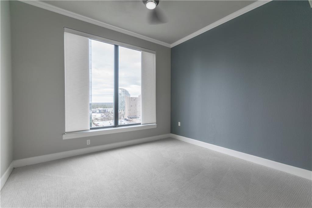 3445 Stratford Road Northeast, Unit 2107 Atlanta, GA 30326 - Photo 7 of 22 an empty room with a window